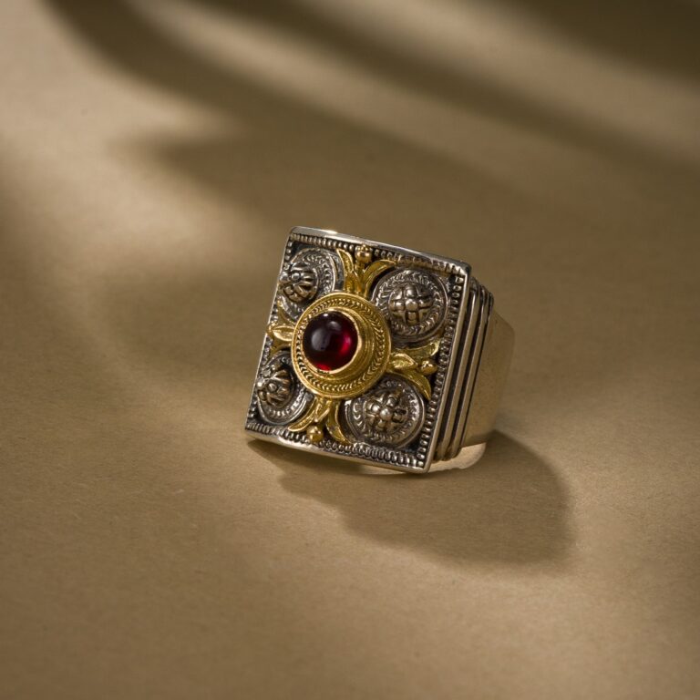Athenian flowers ring in 18K Gold and Sterling Silver with Garnet